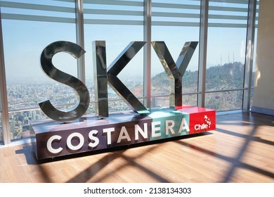 Santiago - Chile - March 05, 2022 - view of "SKY" symbol at the roof top of the Costanera tower center.