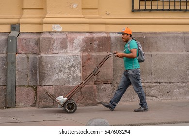 SANTIAGO, CHILE - NOV 1, 2014:  Unidentified Chilean Man With A Carriage In Santiago. Chilean People Are Mainly Of Mixed Spanish And Indigenous Descent