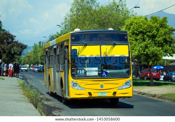 SANTIAGO, CHILE - NOVEMBER 2014: A\
Santiago public Transport Transantiago bus in Puente\
Alto