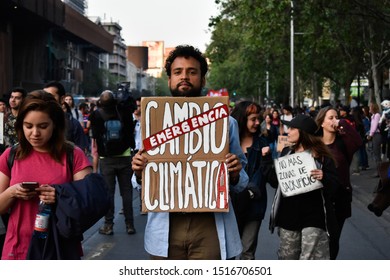 Santiago, Chile - September 27 2019: Fridays For Future And Chilean People On A National Protest For Climate Crisis In The Main Street Of Santiago.