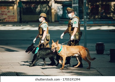 SANTIAGO, CHILE-APRIL 14, 2020 - Police Couple Patrol The Streets Due To The Quarantine That Affects Some Communes Of The City Due To The Covid 19 Pandemic