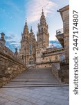 Santiago de Compostela Cathedral at sunrise, Galicia, Spain. Galician gothic church. Popular touristic landmark. Vertical orientation