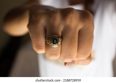 Santiago, Dominican Republic; Oct, 10, 2022:
Person Showing College Ring.