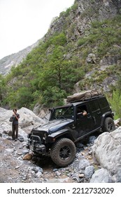 Santiago Nuevo Leon, Mexico. July 16, 2022.   All Terrain Jeep Vehicle Passing A Difficult Path In A Rocky Road.