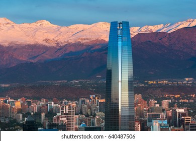 Santiago, Region Metropolitana, Chile - View Gran Torre Santiago, the tallest building in Latin America, a 64-story tall skyscraper with a view of ski centers in the back.