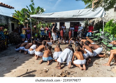 Santo Amaro, Bahia, Brazil - July 24, 2022: Members Of The Cultural Event Nego Fugido Sing And Sit On The Ground For The End Of Slavery In Acupe, Santo Amaro, Bahia.