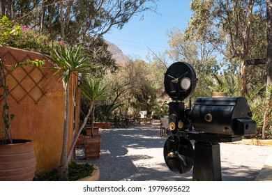 Santorini, Greece - August, 2020: Summer Open Air Cinema Exterior Courtyard Near Kamari.