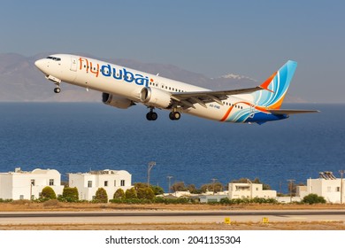 Santorini, Greece - August 4, 2021: FlyDubai Boeing 737 MAX 9 airplane at Santorini airport (JTR) in Greece.