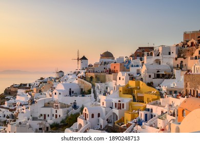 Santorini, Greece - September 17, 2020: Oia village with colorful houses on Santorini island, Cyclades, Greece - Shutterstock ID 1890248713