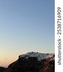 Santorini landscape. Beautiful beach, sky and the cliff. Santorini’s beautiful corner.