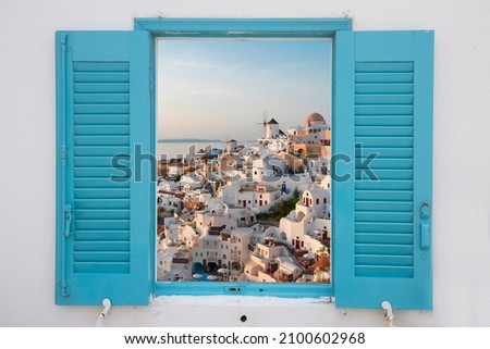 Santorini windows, town with windmills over sea and caldera, Santorini island, Greece, view through window