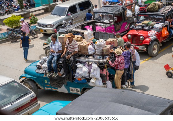 Santuario, Risaralda, Colombia, February 8, 2020.
On market day the Jeep Willys are used for the transport of men and
goods