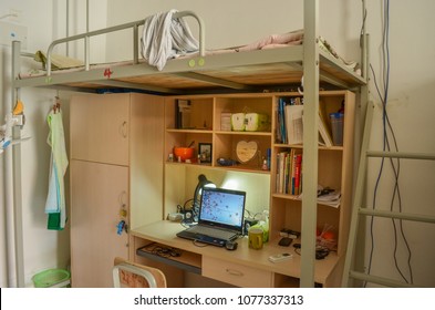 Sanya, Hainan/China-April 29th 2012: Student's Bunk Bed With Study Area In Dorm Room Of Sanya University