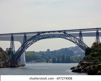 Sao Joao and Maria Pia bridges over Douro river in Oporto, Portugal - Shutterstock ID 697274008