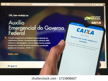 Sao Paulo, Brazil - April 27, 2020: Mobile Phone With Caixa Tem App From Brazilian Federal Government (Covid-19) Showing That The System Has A Lot Of Access And The Beneficiary Needs To Try Later