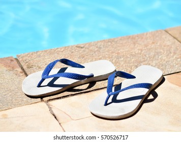 SAO PAULO, BRAZIL - DECEMBER 12th, 2016: Havaianas Sandals (flip Flops) In Front Of A Pool