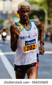 SAO PAULO, BRAZIL - DECEMBER 31, 2016: Giovani Dos Santos Of Brazil During The Sao Silvestre Road Race, A Traditional New Year's Eve Event In Sao Paulo. 