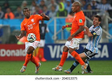 SAO PAULO, BRAZIL - July 9, 2014: Lionel Messi, Georginio Wijnaldum And Nigel De Jong During The 2014 World Cup Semi-finals Between The Netherlands And Argentina At Arena Corinthians. NO USE IN BRAZIL.