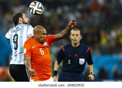 SAO PAULO, BRAZIL - July 9, 2014: Gonzalo Higuain And Nigel De Jong During The 2014 World Cup Semi-finals Game Between The Netherlands And Argentina At Arena Corinthians. NO USE IN BRAZIL.