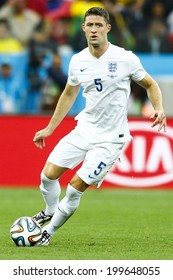 SAO PAULO, BRAZIL - June 19, 2014: Gray Cahill of England kicks the ball during the 2014 World Cup Group D game between Uruguay and England at Arena Corinthians. No Use in Brazil.