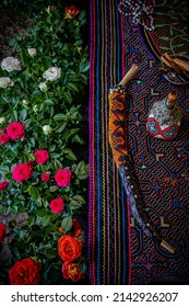 Sao Paulo, SP, Brazil - April 26 2022: Altar for ceremony with flowers, shipibo fabric, kuripes for snuff application