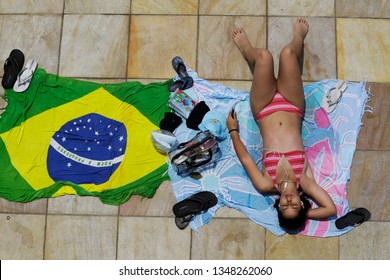 Sao Paulo, SP / Brazil - December 18, 2014: Girl in bikini enjoy the hot summer sun in a public pool. - Shutterstock ID 1348262060