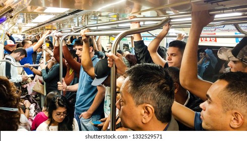 Sao Paulo, SP, Brazil - February 28, 2019: Crowded Subway Line On Rush Hour In Sao Paulo, Brazil. Public Transport, One Of The Historical Issues In Sao Paulo's Metropolis. Luz Station, Line 1 Blue.