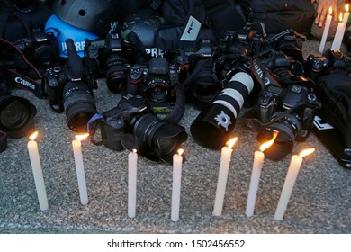 Sao Paulo, SP / Brazil - February 12, 2014: Photojournalists Light Candles During A Vigil After A Video Journalist Get Killed While Covering A Protest In Rio De Janeiro.