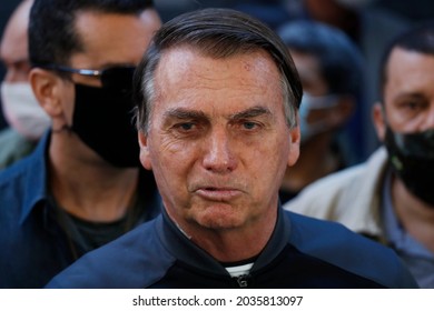 Sao Paulo, SP, Brazil - July 18, 2021: Brazil's President Jair Bolsonaro speaks with reporters as he leaves the hospital after recovering from an intestinal obstruction.