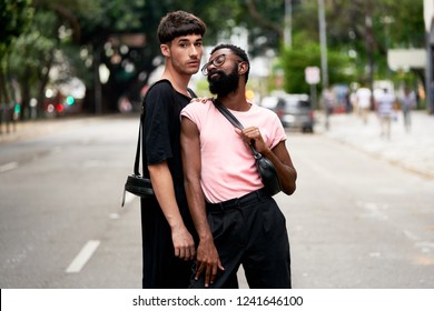 Sao Paulo, SP, Brazil, Nov, 2018:  Real Multiethnic Gay Couple, Afro American And White Man Embrance, Hands Together In Love. Authentic Street Style Fashion Shoot And Rights Celebration 