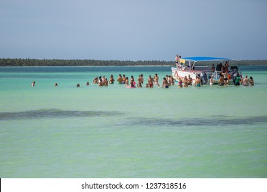 Saona Island, Este National Park, Dominican Republic - August 11, 2018: Boat Tour And Water Party.  Group Of Friends Enjoying A Summer Day On Yacht. Tropical Beach In Caribbean Sea