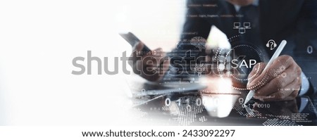 SAP - Business process automation software and management software, Businessman using digital tablet with ERP enterprise resources planning system concept, data processing, business intelligence