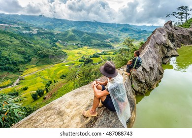 SAPA, VIETNAM - 14 SEPTEMBER: A Family Of The Black H'mong Ethnic Minority People Sit On Hill In Sapa, Vietnam On September 14, 2016. H'mong Are The 8th Largest Ethnic Group In Vietnam