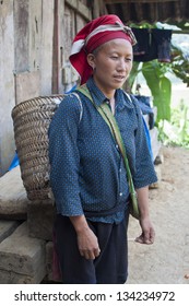 SAPA, VIETNAM - AUG 12: Unidentified woman from the Red Dzao Ethnic Minority on Aug 12, 2012 in Sapa, Vietnam. Red Dzao tribe is one of the minority tribes in Vietnam.
