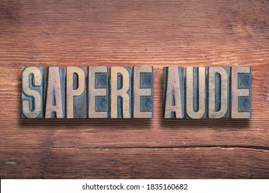 Sapere Aude Ancient Latin School Motto - Dare To Know, Combined On Vintage Varnished Wooden Surface