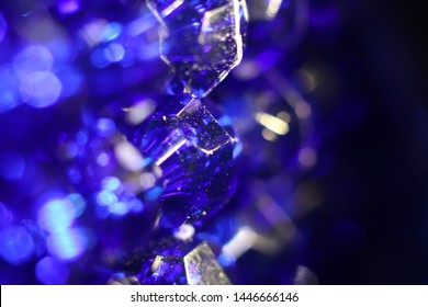 Sapphire Blue Gem Beads Blur Background