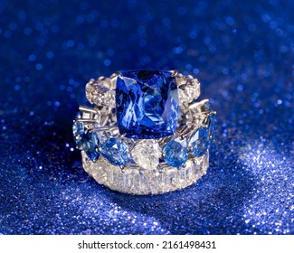 Sapphire ring, on blue background - Shutterstock ID 2161498431