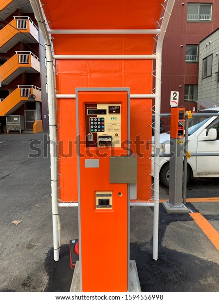 Sapporo\
city ,Hokkaido Province/Japan:December 19 2019: Auto detected\
camera recording type  coins parking in Japan\
.