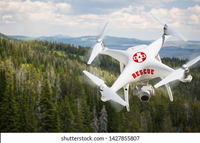SAR - Search And Rescue Unmanned Aircraft System, (UAS) Drone Flying Above A Mountain Forest.