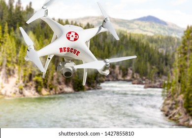 SAR - Search And Rescue Unmanned Aircraft System, (UAS) Drone Flying Above River In The Wilderness.