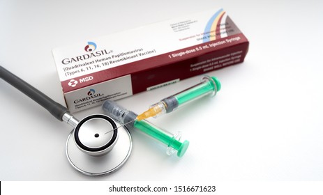 Saraburi, Thailand /September 2019:Injection needle with stethoscope  and vaccine box"GARDASIL" put on Isolated white background. Concept Prevent HPV infection by vaccination before getting infected.
