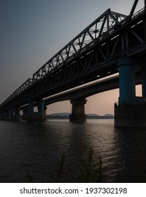 Saraighat Bridge With Blue And Orange Sky At Sunset