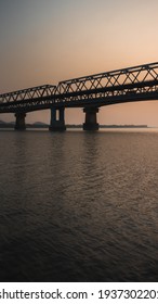 Saraighat Bridge With Blue And Orange Sky At Sunset