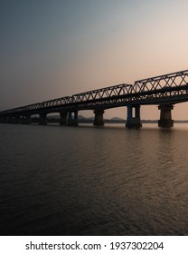 Saraighat Bridge With Blue And Orange Sky At Sunset