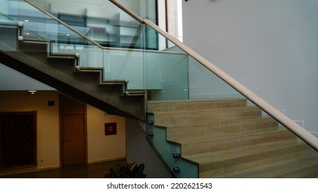 SARAJEVO, BOSNIA AND HERCEGOVINA, 15.9.2022: Interior In City Business Building, Modern Office Interior Stairs And Fences Made Of Glass.