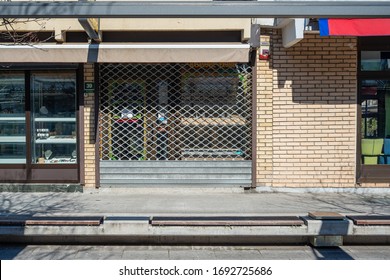 Sarajevo /Bosnia And Herzegovina - 04.03.2020: Closed Store Front In Empty Street, Closed Doors Of Small Business Owners Due To Coronavirus Restriction No People