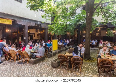 SARAJEVO, BOSNIA AND HERZEGOVINA - JUNE 12, 2019: Open air cafe in Bascarsija disctrict of Sarajevo. Bosnia and Herzegovina