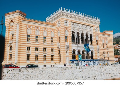 SARAJEVO, BOSNIA AND HERZEGOVINA - Oct 22, 2021: A Beautiful Shot Of The Presidency Of Bosnia And Herzegovina In Sarajevo And A National Flag