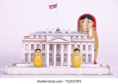 SARANSK, RUSSIA - SEPTEMBER 05, 2017: Group Of Matryoshka Dolls Near 3D Puzzle Of The White House. Abstract Illustration Of Russian Interference In United States Policy.