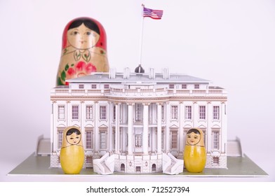 SARANSK, RUSSIA - SEPTEMBER 05, 2017: Group Of Matryoshka Dolls Near 3D Puzzle Of The White House. Abstract Illustration Of Russian Interference In United States Policy.